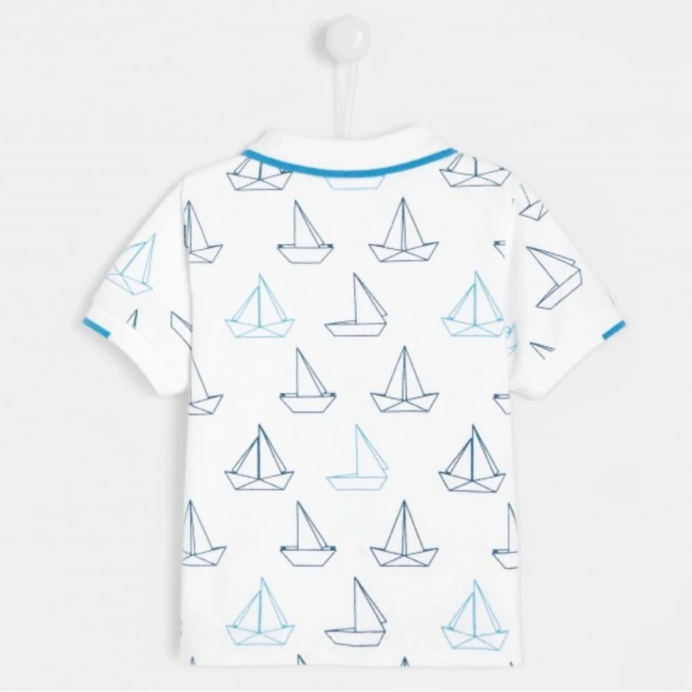 Jacadi Boys White Pique Knit Polo Shirt with Blue Sailboat Print - Size 12M
